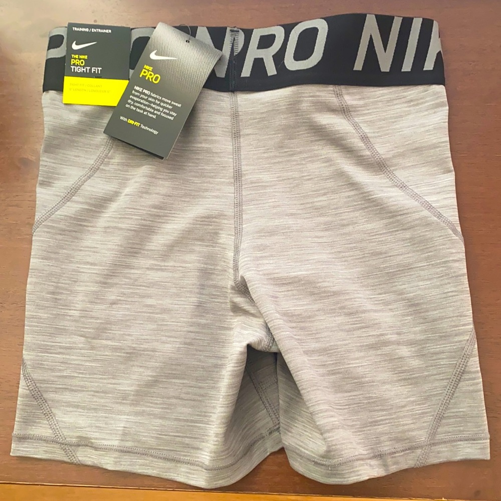 Women’s Nike Pro’s New Never Been Worn. Size Small . Light Grey. 5” Length.